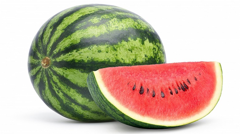Whole and sliced watermelon