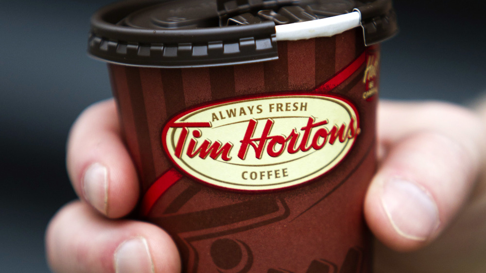 Tim Hortons coffee cup hand