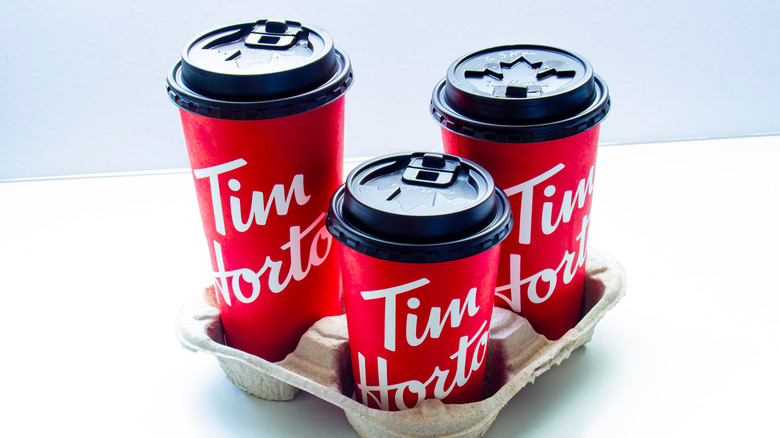 Three Tim Hortons coffee cups