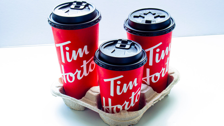 Tim Horton coffee cups in a drink holder