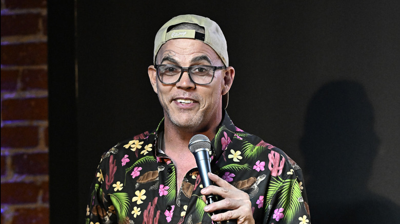 Steve-O with a microphone