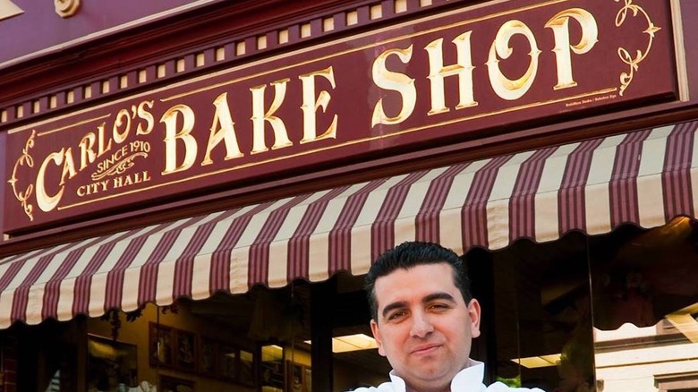 Buddy Valastro standing outside original Carlo's Bake Shop