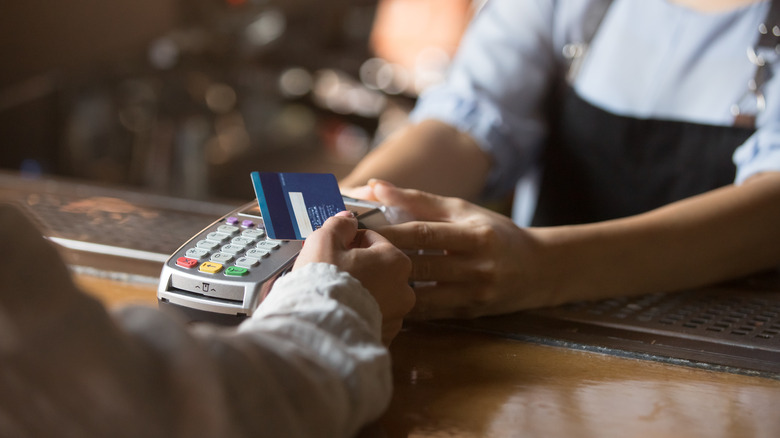 customer paying with debit card