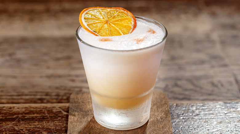 Glass of whiskey sour