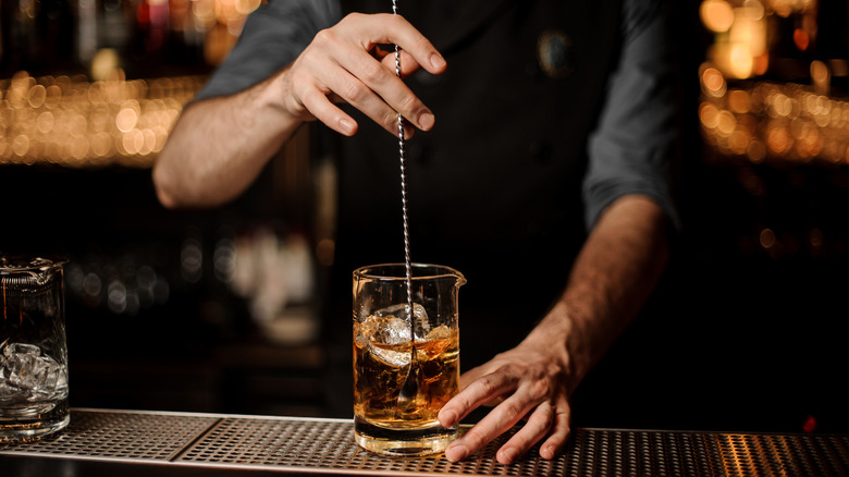 Stirring a cocktail