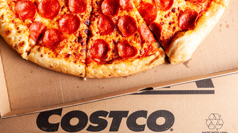 A box containing Costco pepperoni pizza with store logo at the bottom.