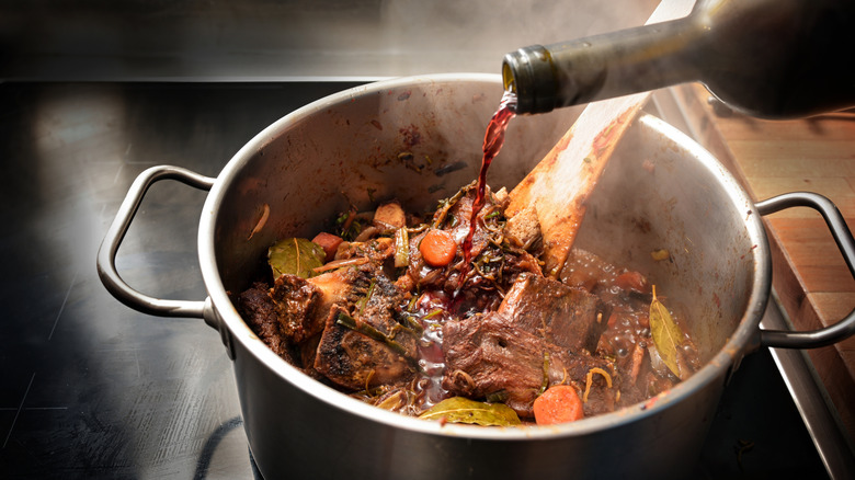 Wine being poured into pot