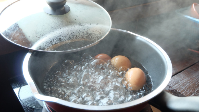 eggs boiling in a pot