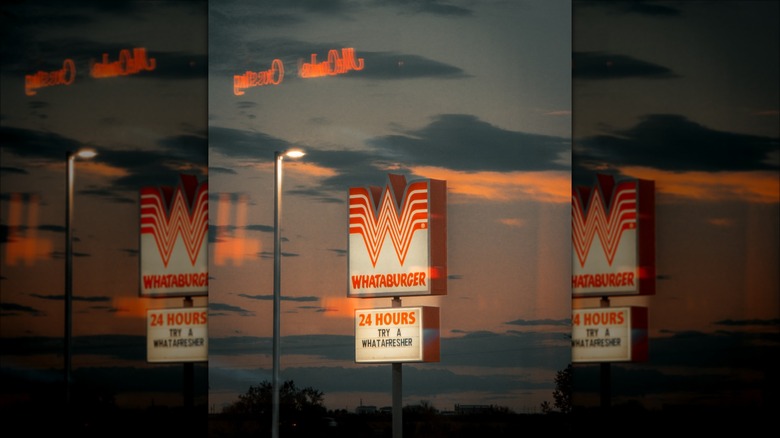 Whataburger light-up signage during dusk.