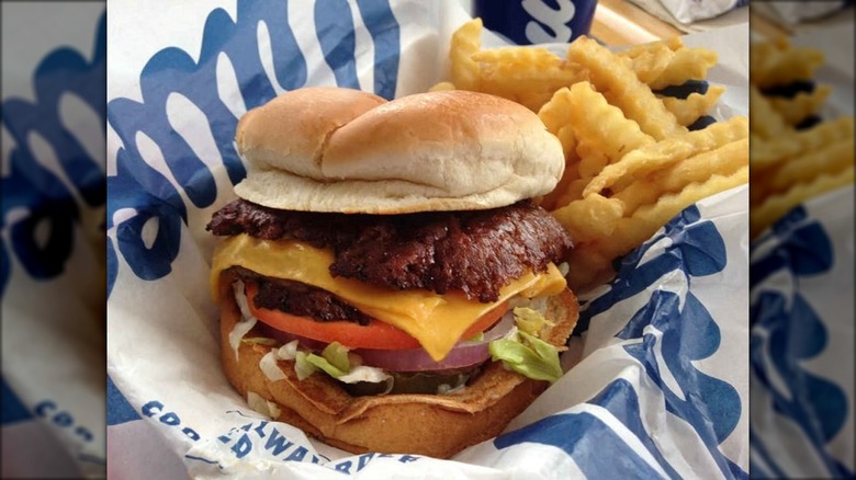 Culver's Deluxe ButterBurger in basket with fries.