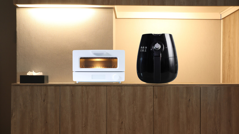 Toaster oven and air fryer on kitchen counter
