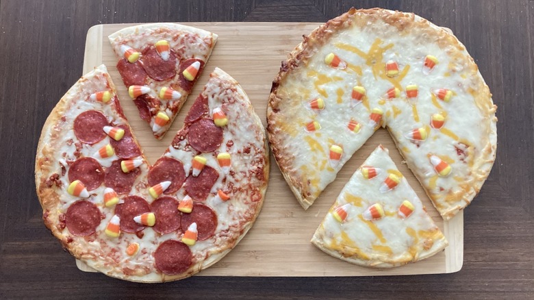 Two Tombstone pizzas topped with candy corns