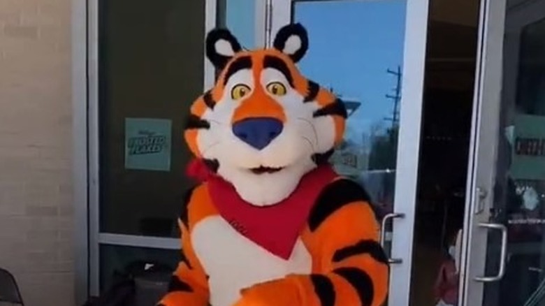 Tony the Tiger masco doing a TikTok dance