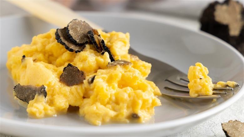 Scrambles eggs topped with truffles