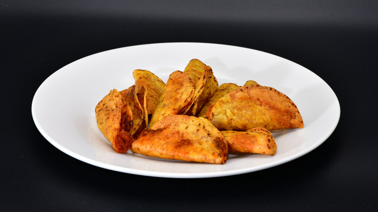 Mini tacos on dark background