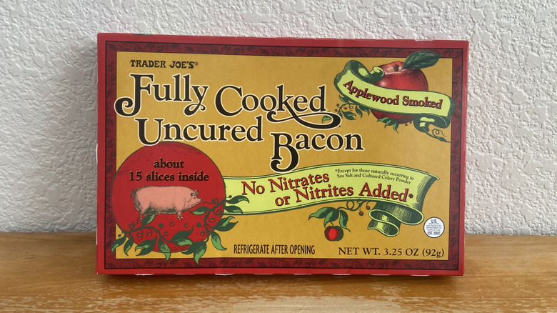Box of Trader Joe's Fully Cooked Uncured Bacon on table