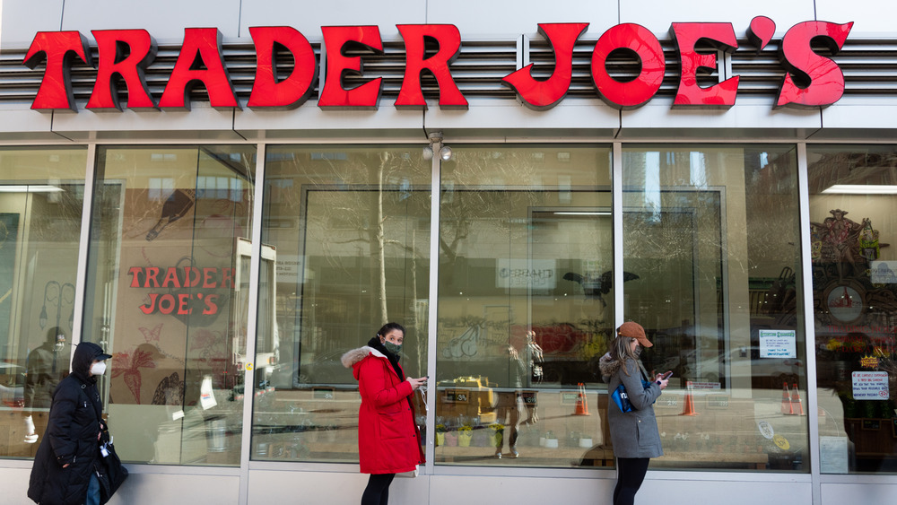 People outside Trader Joe's store exterior