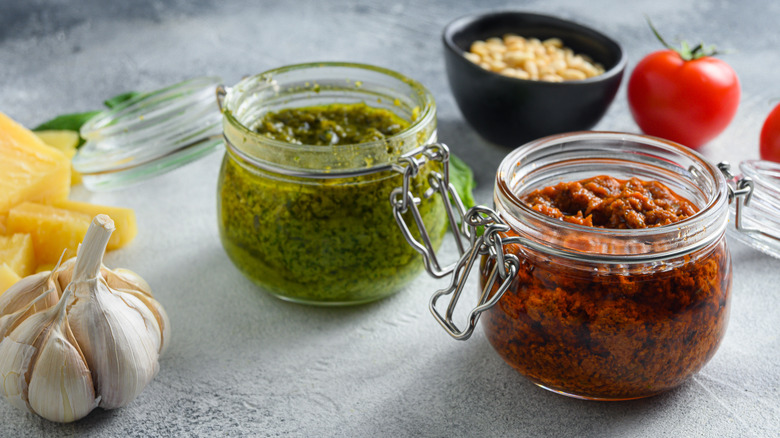 jars filled with pesto sauce