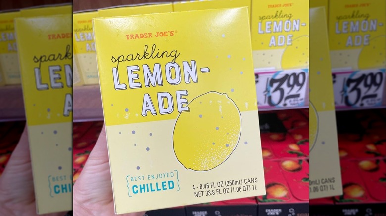 Hand holding Trader Joe's Sparkling Lemonade