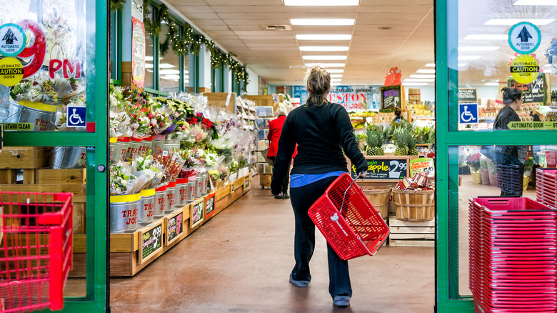 Shopper heading into Trader Joe's 