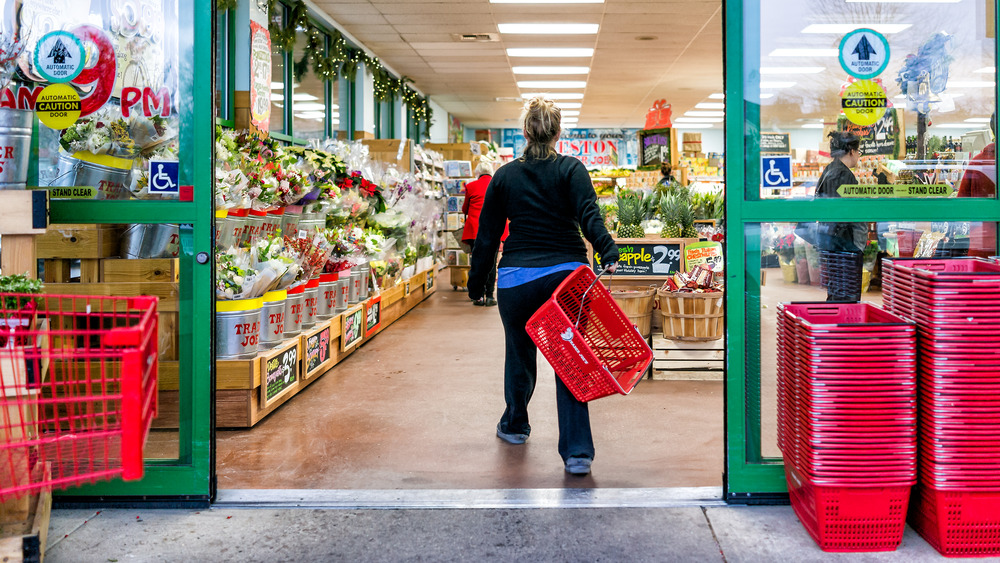 A customer entering Trader Joe's
