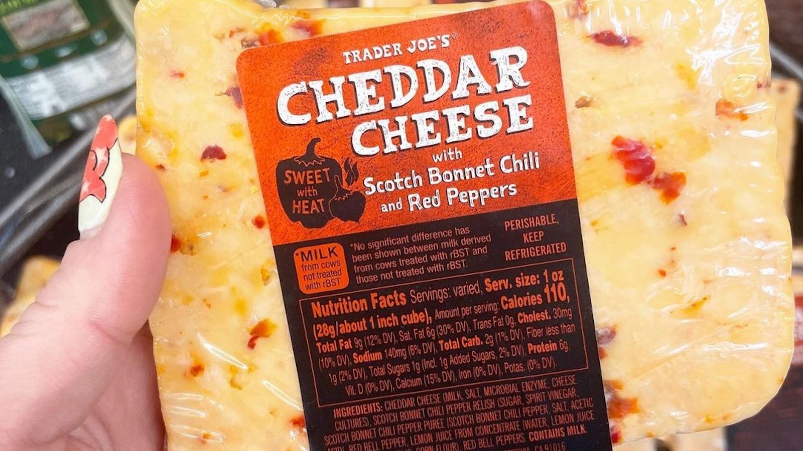 Trader Joe's Fans Can't Get Enough Of This Spicy New Cheddar Cheese