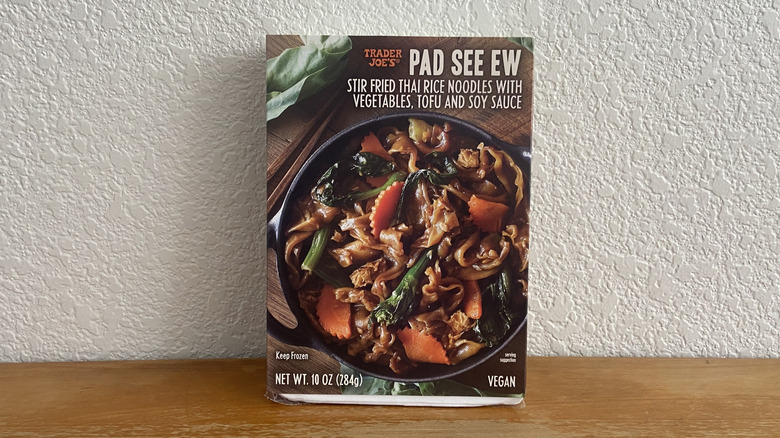 pad see ew box on wooden table