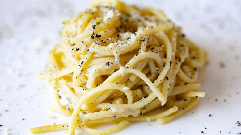 a small portion of cacio e pepe pasta