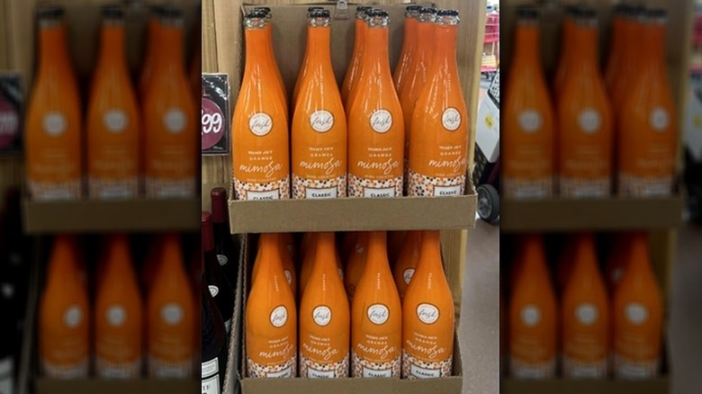 Bottles of an orange flavored mimosa wine cocktail at Trader Joe's.