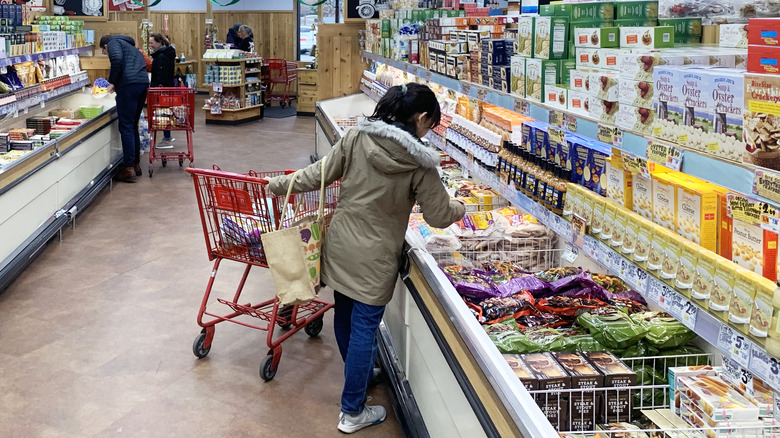 Trader Joe's shoppers browsing the grocer's freezer section