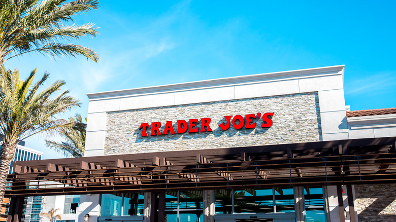 Exterior of Trader Joe's building with palm trees