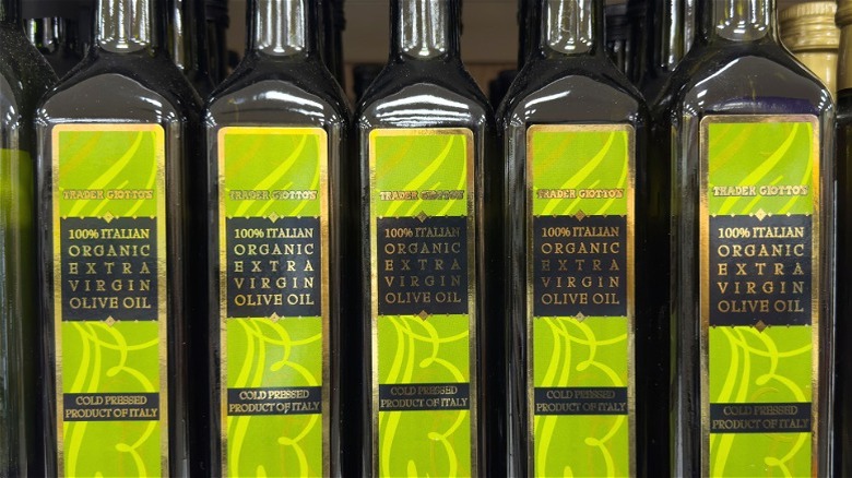 Trader Joe's Italian organic extra-virgin olive oil bottles on a shelf