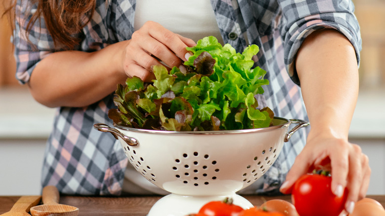 Person making a salad