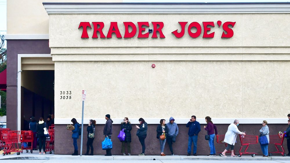 people lined up outside Trader Joe's