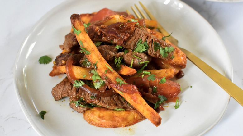 beef and fries on plate