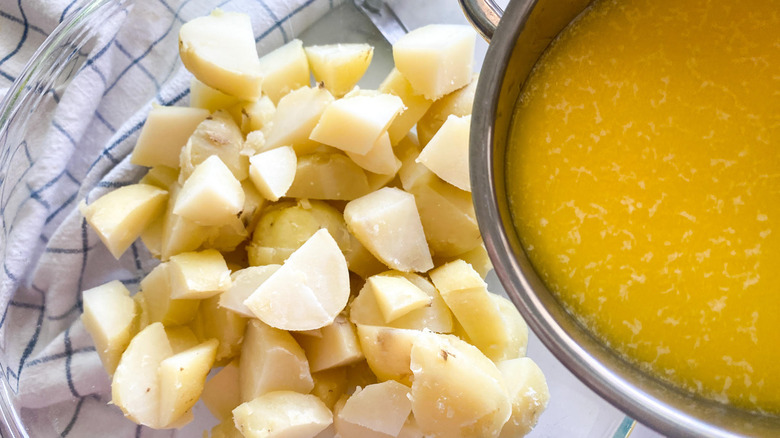 adding butter and milk