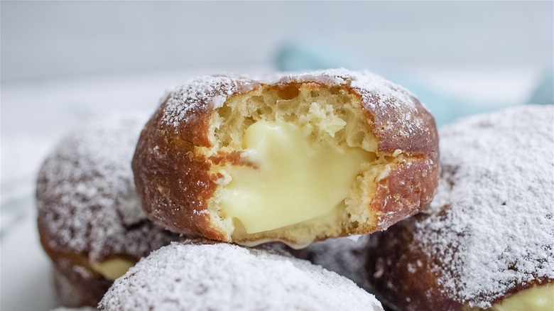 close-up of cream filled doughnut