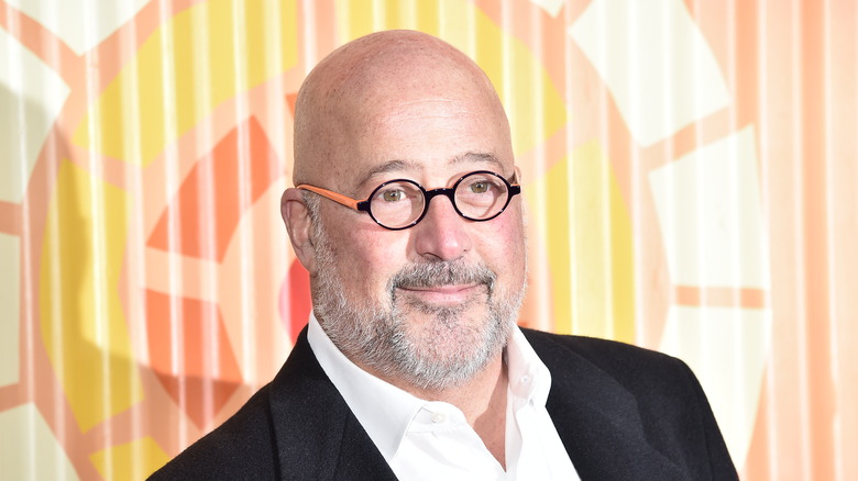 Andrew Zimmern with circle framed glasses