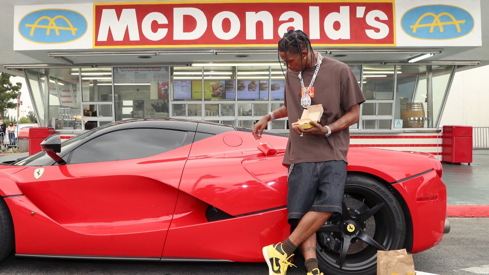 Travis Scott and his Ferrari at McDonald's