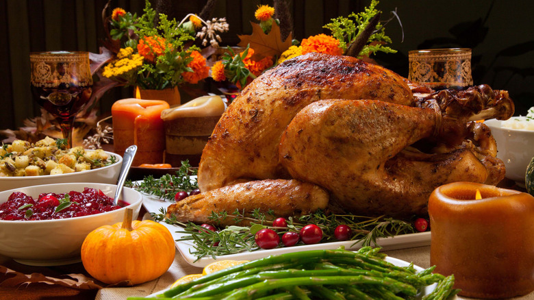 Thanksgiving day meal with turkey and side dishes