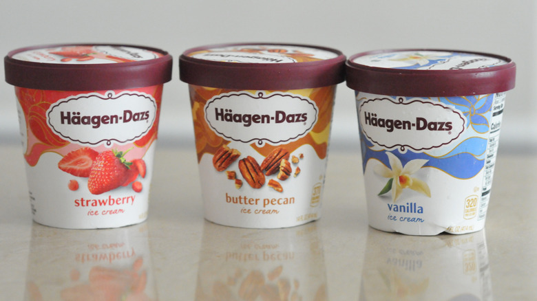 Three pints of Häagen-Dazs ice cream.