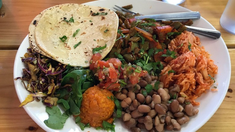Plate of vegan Mexican food from Tumerico