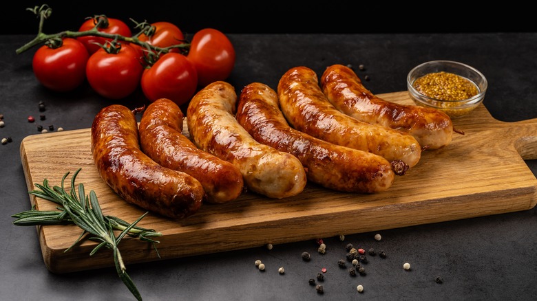 Sausages on a wooden board