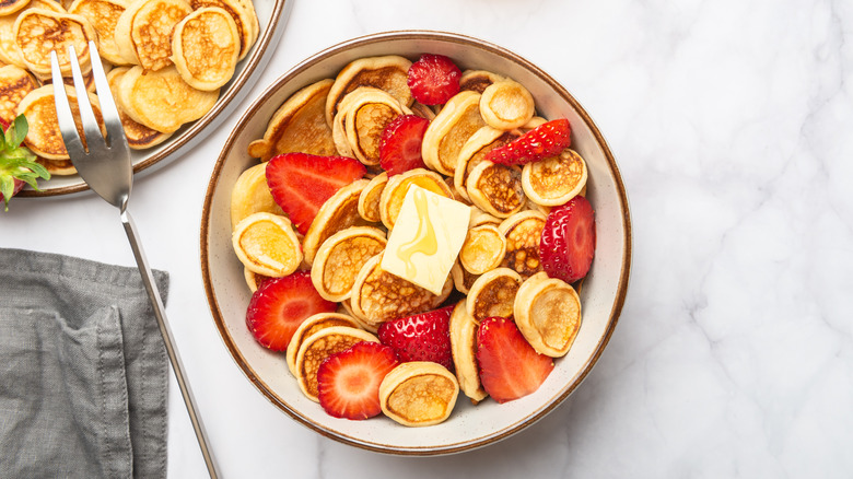 Homemade pancake cereal with strawberries