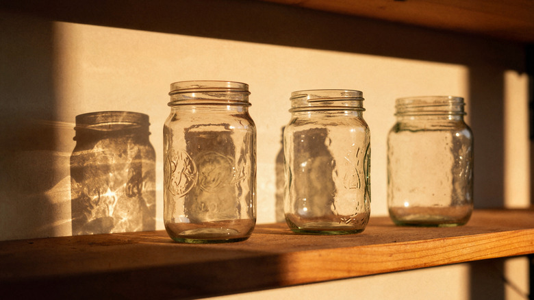 Mason jars on a pantry shelf