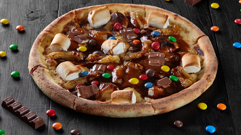 pizza topped with candy pieces 