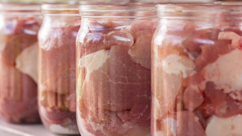 raw meat in jars