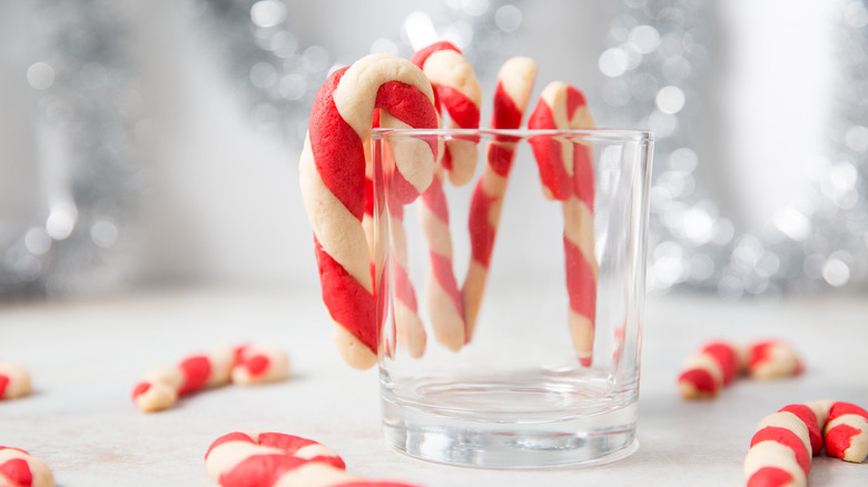 candy cane cookies hanging on glass