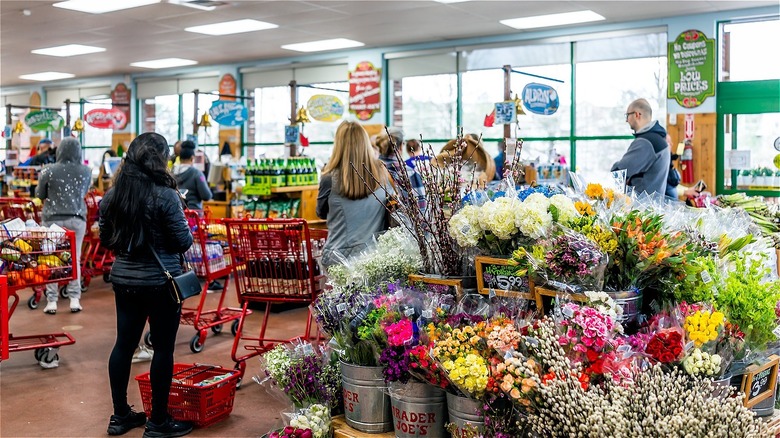 Trader Joe's checkout line and flower section