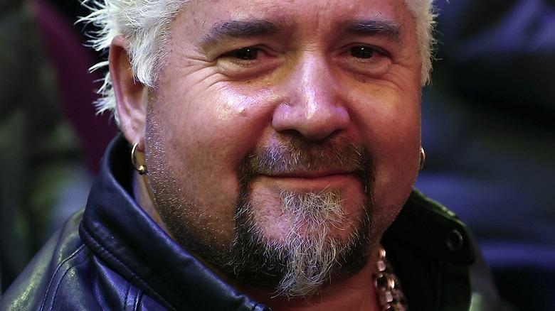 Guy Fieri with slight smile